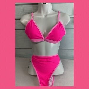 Pink two piece swimsuit.